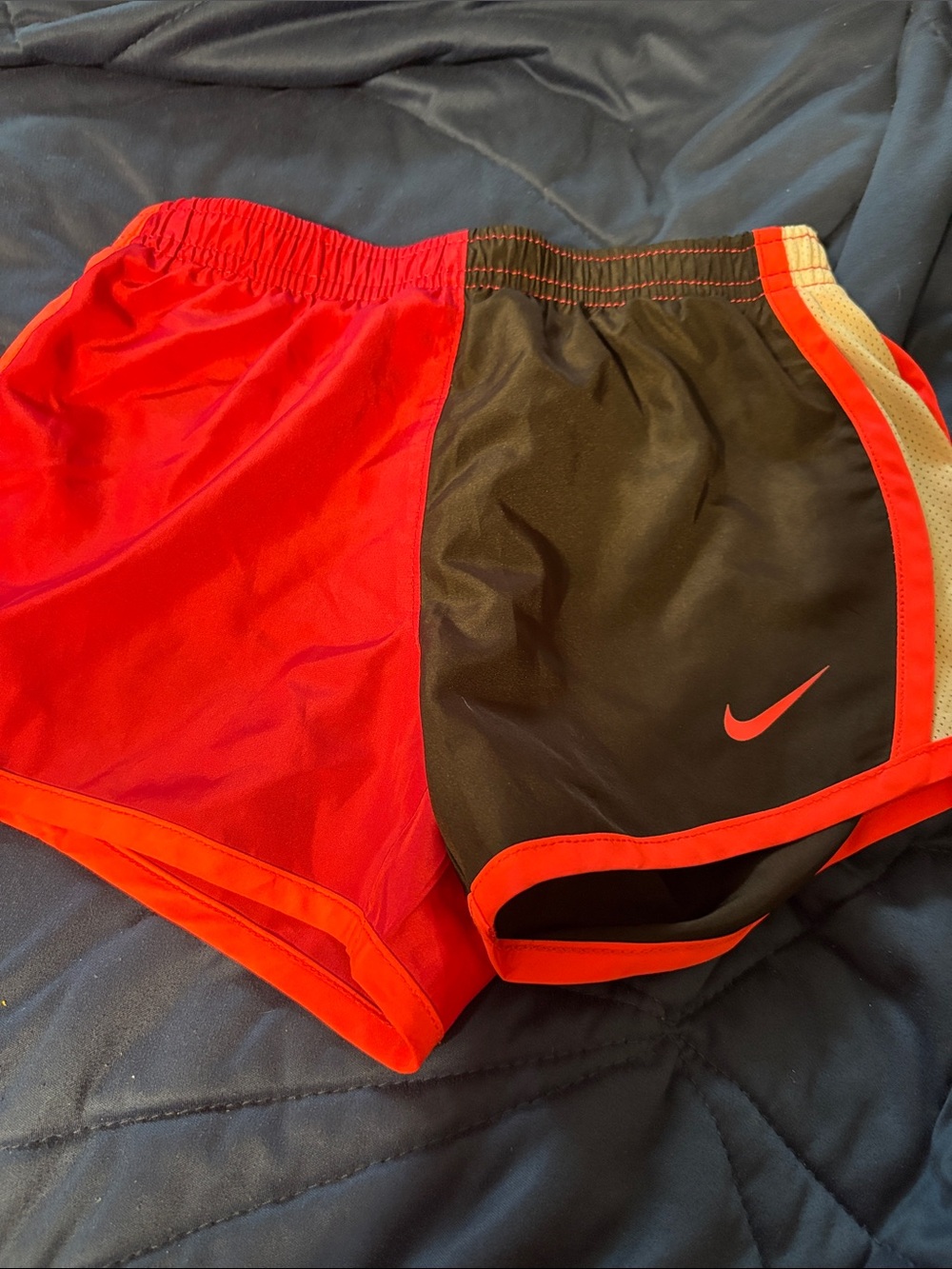 Nike Women's Red and Black Athletic Running Shorts with Orange Trim